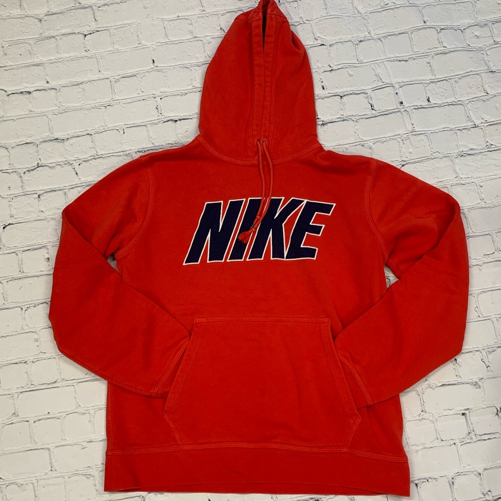 •Red Nike hoodie
